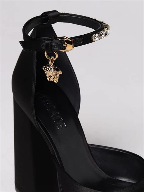 versace high heel shoes.